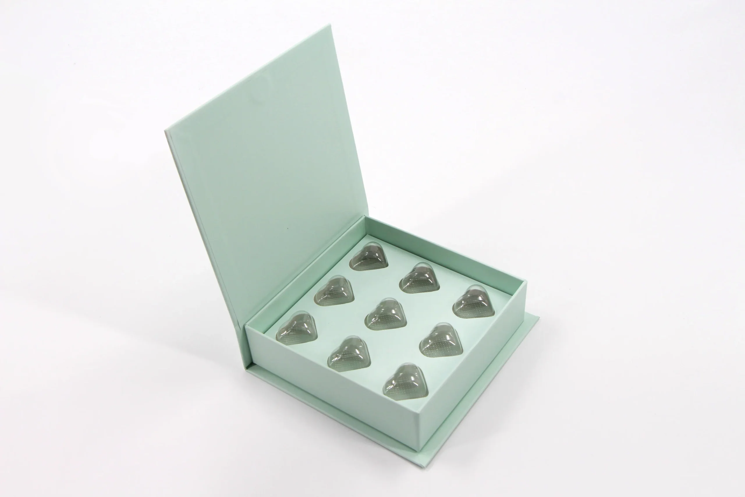 Luxury chocolate box open, top view of compartments
